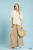 Umgee Textured Short Sleeve Top with Contrast Trim  Style Ratio